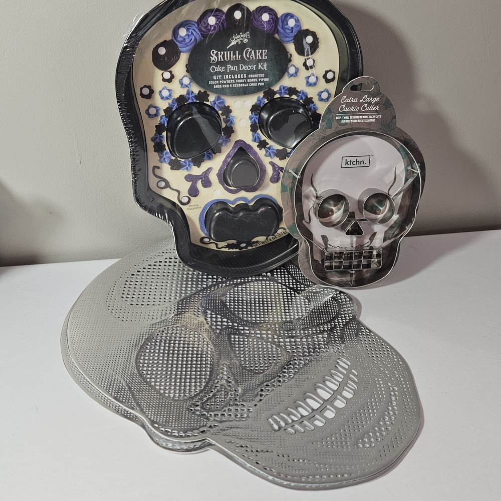 NWT Skull Cake Pan, Skull Cookie Cutter, 2 Scull Silver Place Mats.
